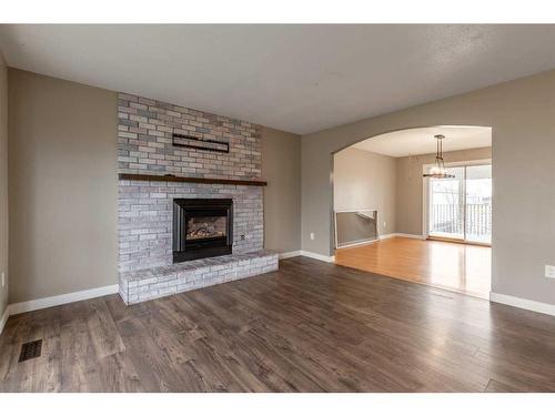 120 16 Street, Fort Macleod, AB - Indoor Photo Showing Living Room With Fireplace