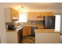 152 Blackfoot Circle West, Lethbridge, AB  - Indoor Photo Showing Kitchen With Double Sink 