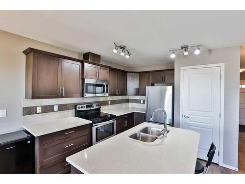 1-1212 Keystone Road West, Lethbridge, AB - Indoor Photo Showing Kitchen With Stainless Steel Kitchen With Double Sink With Upgraded Kitchen