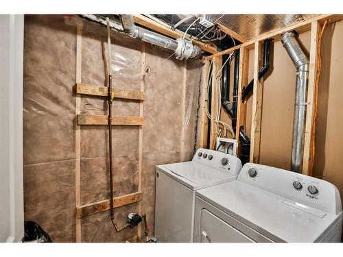 1-1212 Keystone Road West, Lethbridge, AB - Indoor Photo Showing Laundry Room