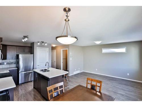 1-1212 Keystone Road West, Lethbridge, AB - Indoor Photo Showing Kitchen With Double Sink