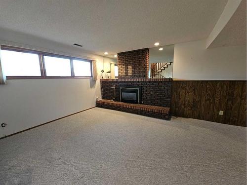 3725 Oak Drive South, Lethbridge, AB - Indoor With Fireplace