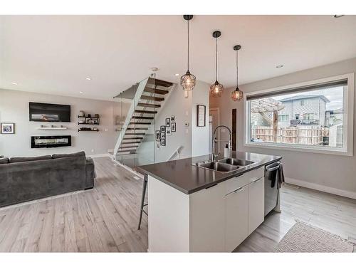 23 Country Meadows Boulevard West, Lethbridge, AB - Indoor Photo Showing Kitchen With Double Sink