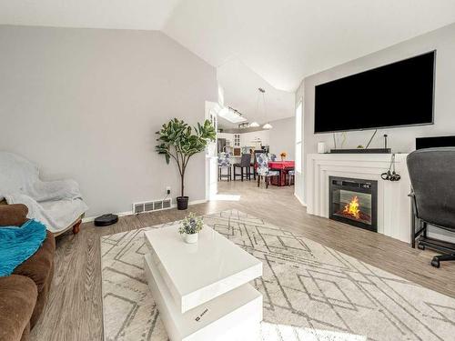 355 Fairmont Boulevard South, Lethbridge, AB - Indoor Photo Showing Living Room With Fireplace