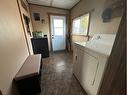 619 5A Avenue, Vauxhall, AB  - Indoor Photo Showing Laundry Room 