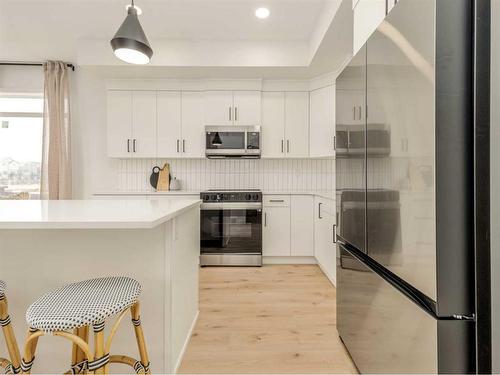 64 Blackwolf Lane North, Lethbridge, AB - Indoor Photo Showing Kitchen