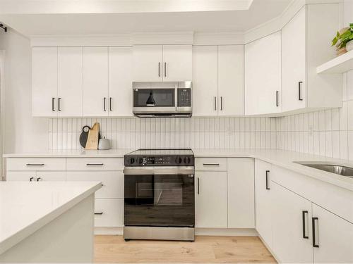 64 Blackwolf Lane North, Lethbridge, AB - Indoor Photo Showing Kitchen