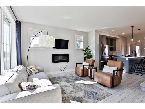 4311 Fairmont Gate South, Lethbridge, AB - Indoor Photo Showing Living Room With Fireplace