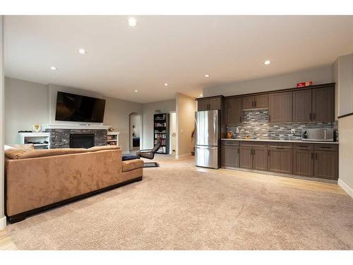 2413 Aspen Drive, Coaldale, AB - Indoor With Fireplace