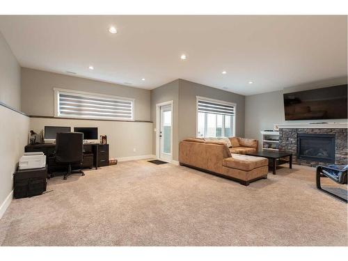 2413 Aspen Drive, Coaldale, AB - Indoor With Fireplace