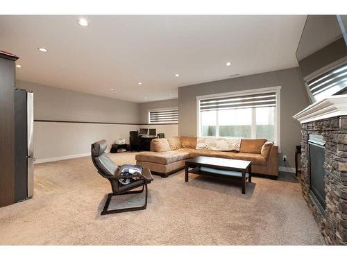 2413 Aspen Drive, Coaldale, AB - Indoor With Fireplace