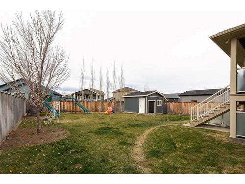 2413 Aspen Drive, Coaldale, AB - Outdoor With Backyard