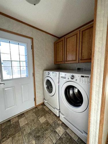 2026 136 Street, Blairmore, AB - Indoor Photo Showing Laundry Room