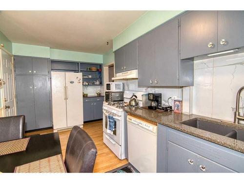 807 8 Avenue South, Lethbridge, AB - Indoor Photo Showing Kitchen With Double Sink