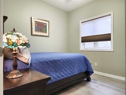 609 46 Avenue West, Claresholm, AB - Indoor Photo Showing Bedroom