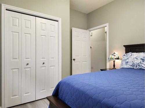 609 46 Avenue West, Claresholm, AB - Indoor Photo Showing Bedroom