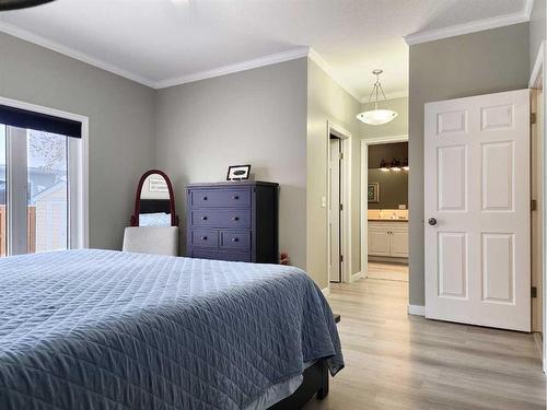 609 46 Avenue West, Claresholm, AB - Indoor Photo Showing Bedroom