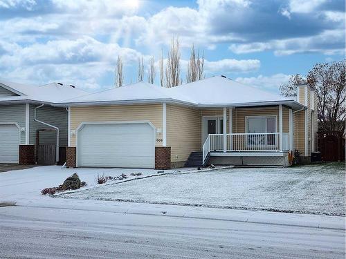 609 46 Avenue West, Claresholm, AB - Outdoor With Deck Patio Veranda