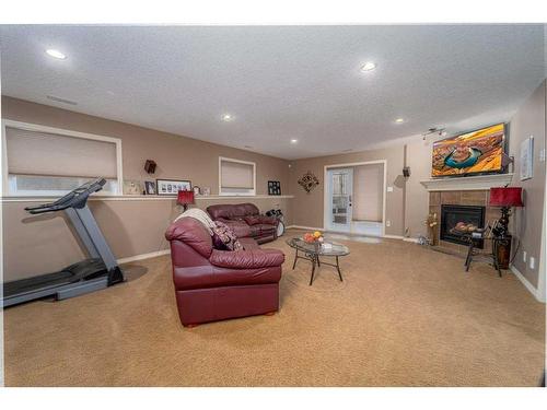 91 Gateway Mews South, Lethbridge, AB - Indoor With Fireplace