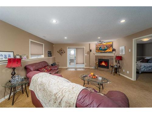 91 Gateway Mews South, Lethbridge, AB - Indoor With Fireplace