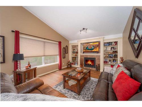 91 Gateway Mews South, Lethbridge, AB - Indoor Photo Showing Living Room With Fireplace