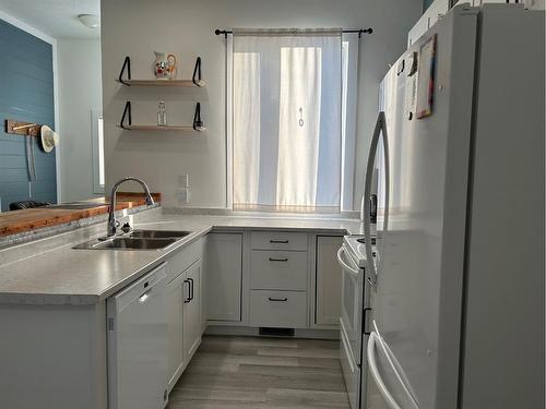 172 N 1 Street West, Magrath, AB - Indoor Photo Showing Kitchen With Double Sink