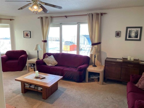 122061A 501 Highway East, Milk River, AB - Indoor Photo Showing Living Room