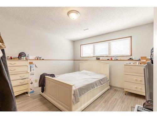 1626 & 1628 3 Avenue North, Lethbridge, AB - Indoor Photo Showing Bedroom