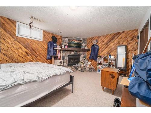 1910 20 Street North, Lethbridge, AB - Indoor Photo Showing Other Room With Fireplace