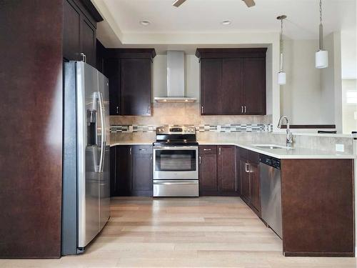 470 Mt Sundance Landing West, Lethbridge, AB - Indoor Photo Showing Kitchen With Stainless Steel Kitchen With Double Sink With Upgraded Kitchen