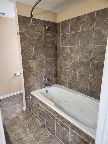 502 Centennial Avenue, Nobleford, AB - Indoor Photo Showing Bathroom