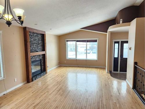 502 Centennial Avenue, Nobleford, AB - Indoor With Fireplace