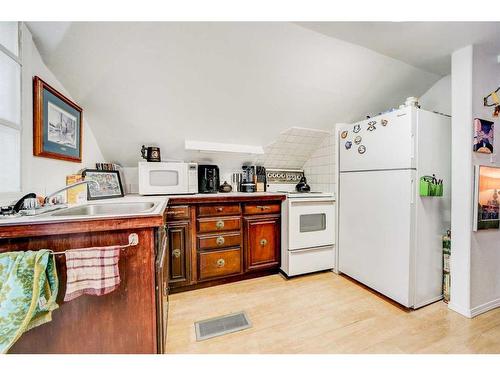 612 6 Street South, Lethbridge, AB - Indoor Photo Showing Kitchen With Double Sink