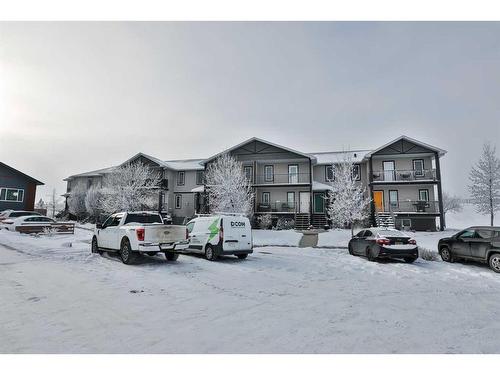 7-3814 Sundance Close, Coalhurst, AB - Outdoor With Facade