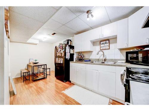 51 Trent Road West, Lethbridge, AB - Indoor Photo Showing Kitchen With Double Sink