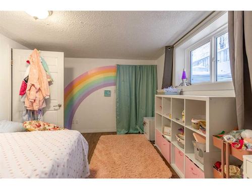 239 52 Avenue, Coalhurst, AB - Indoor Photo Showing Bedroom