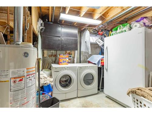 239 52 Avenue, Coalhurst, AB - Indoor Photo Showing Laundry Room