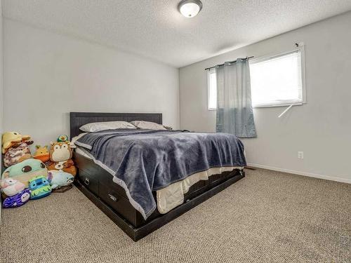 2111 16 Avenue, Coaldale, AB - Indoor Photo Showing Bedroom