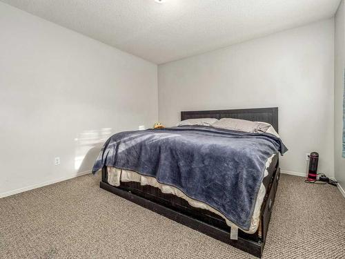 2111 16 Avenue, Coaldale, AB - Indoor Photo Showing Bedroom