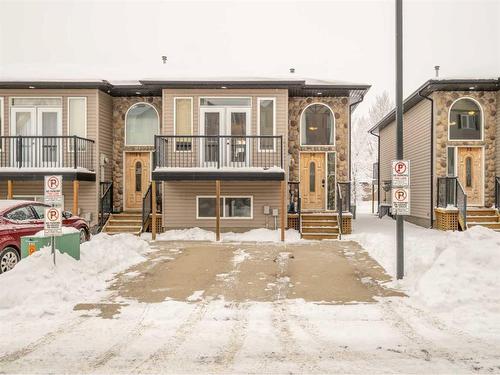 30-762 Heritage Boulevard West, Lethbridge, AB - Outdoor With Balcony With Facade