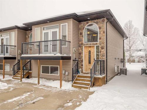 30-762 Heritage Boulevard West, Lethbridge, AB - Outdoor With Balcony With Deck Patio Veranda With Facade