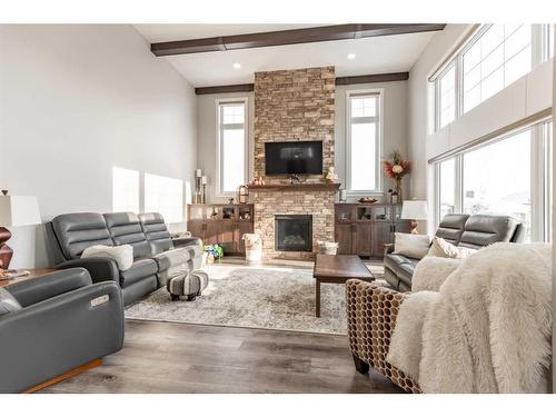 2505 Aspen Drive, Coaldale, AB - Indoor Photo Showing Living Room With Fireplace