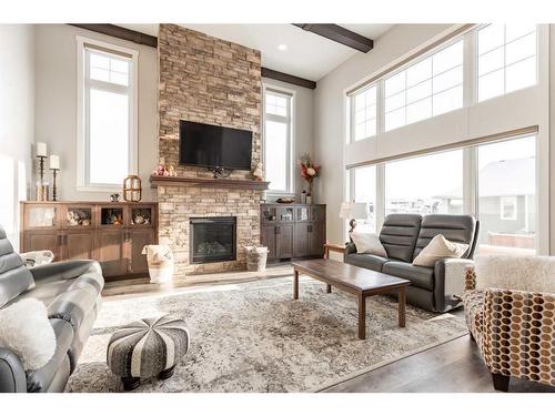 2505 Aspen Drive, Coaldale, AB - Indoor Photo Showing Living Room With Fireplace