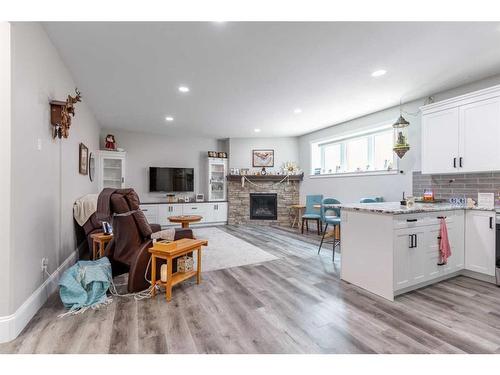 2505 Aspen Drive, Coaldale, AB - Indoor With Fireplace