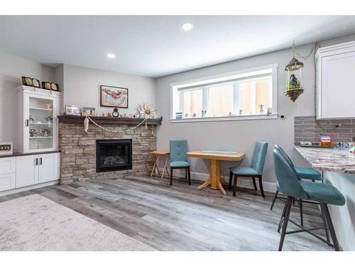 2505 Aspen Drive, Coaldale, AB - Indoor With Fireplace