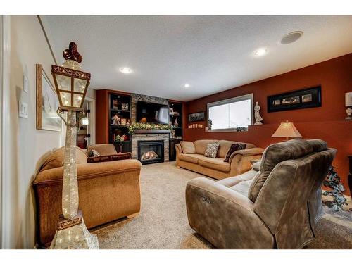 238 Keystone Lane West, Lethbridge, AB - Indoor Photo Showing Living Room With Fireplace