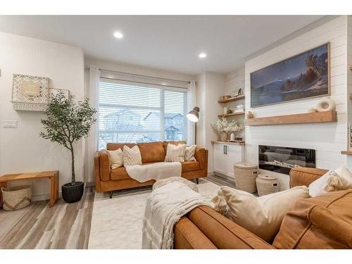 306 Crocus Terrace West, Lethbridge, AB - Indoor Photo Showing Living Room With Fireplace