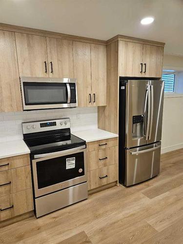 1139 Coalbrook Place West, Lethbridge, AB - Indoor Photo Showing Kitchen