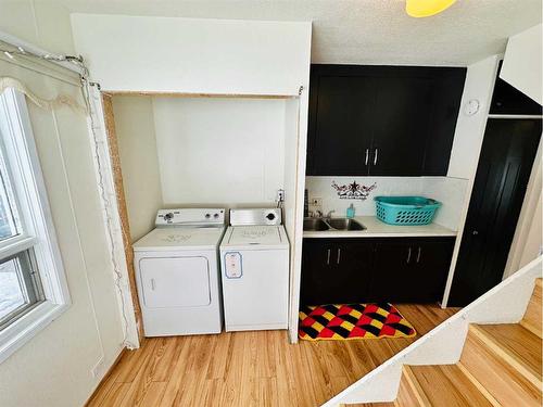 145 6 Street, Stirling, AB - Indoor Photo Showing Laundry Room