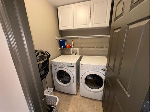 172 Riverstone Boulevard West, Lethbridge, AB - Indoor Photo Showing Laundry Room